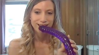 This Babe takes a giant sex-toy in her wazoo