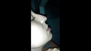 Crazy color haired chick works cocks in the gloryhole