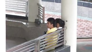 Voyeur tapes an asian girl fucking her bf in public