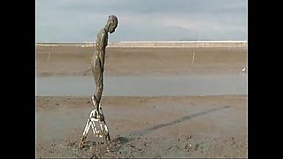 Girl Diving Headfirst Into Deep Mud